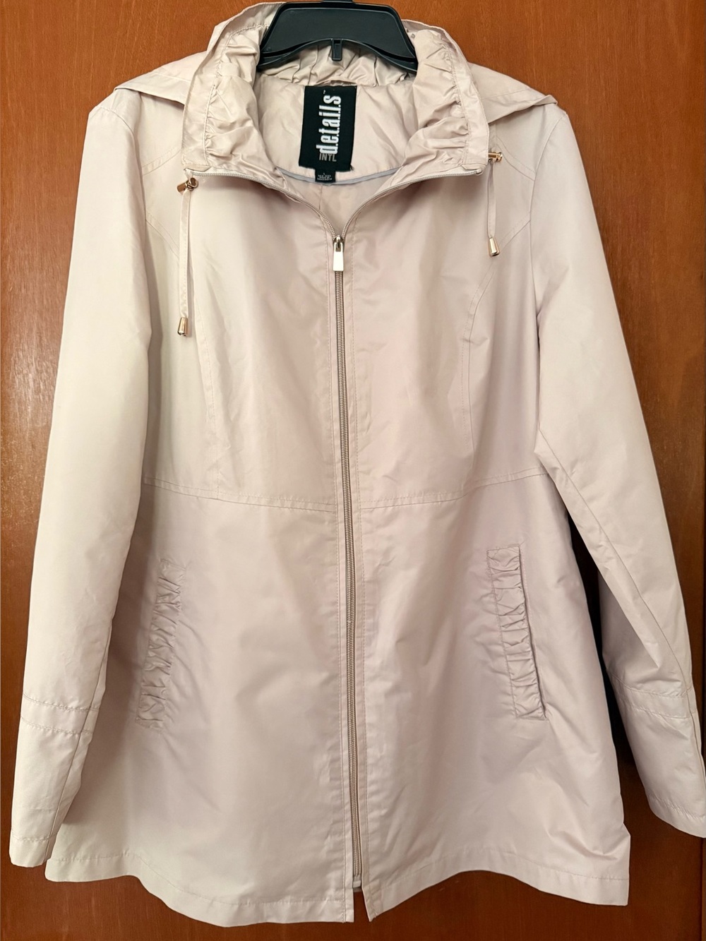 INTL d.e.t.a.i.l.s Woman’s Rain jacket